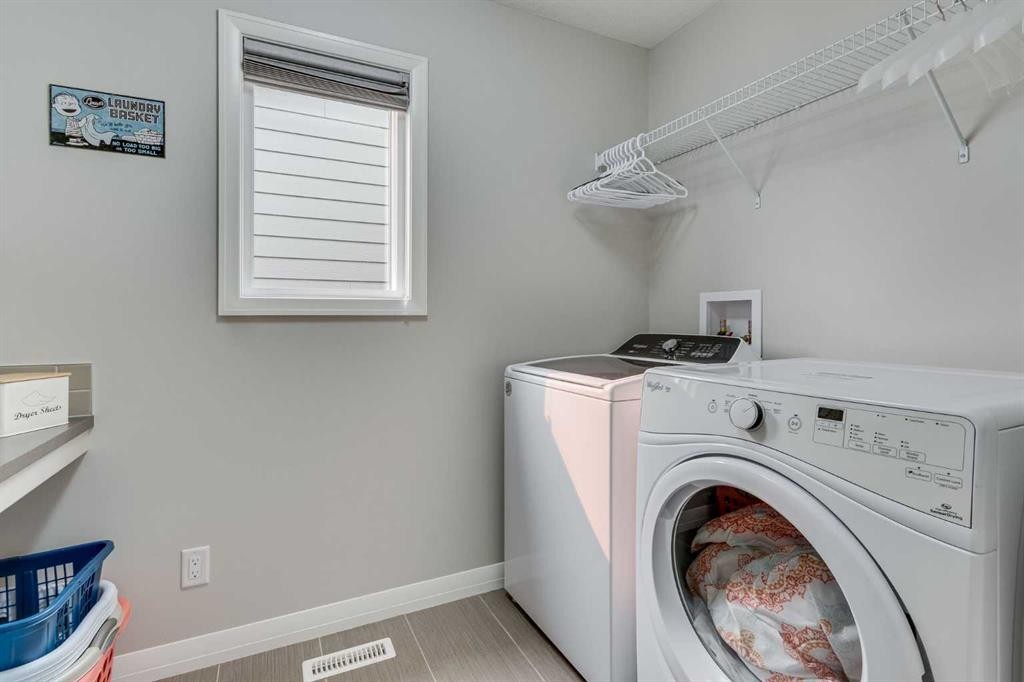 55 Sage Bluff Green Nw, Calgary, AB - Indoor Photo Showing Laundry Room