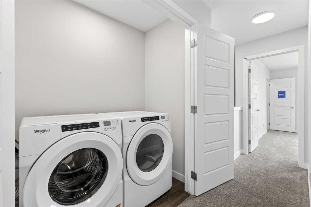 121-1750 Rangeview Drive Se, Calgary, AB - Indoor Photo Showing Laundry Room