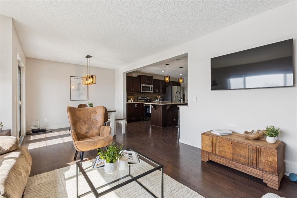 298 River Heights Crescent, Cochrane, AB - Indoor Photo Showing Living Room