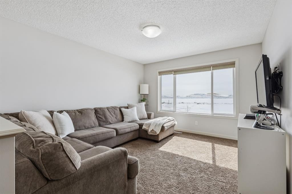 298 River Heights Crescent, Cochrane, AB - Indoor Photo Showing Living Room
