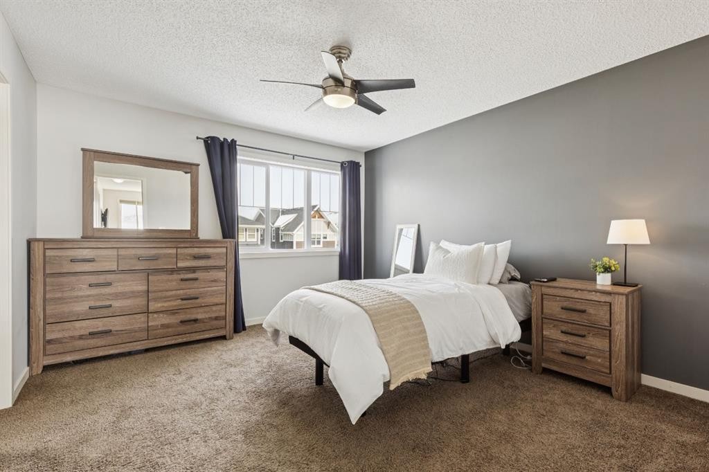 298 River Heights Crescent, Cochrane, AB - Indoor Photo Showing Bedroom