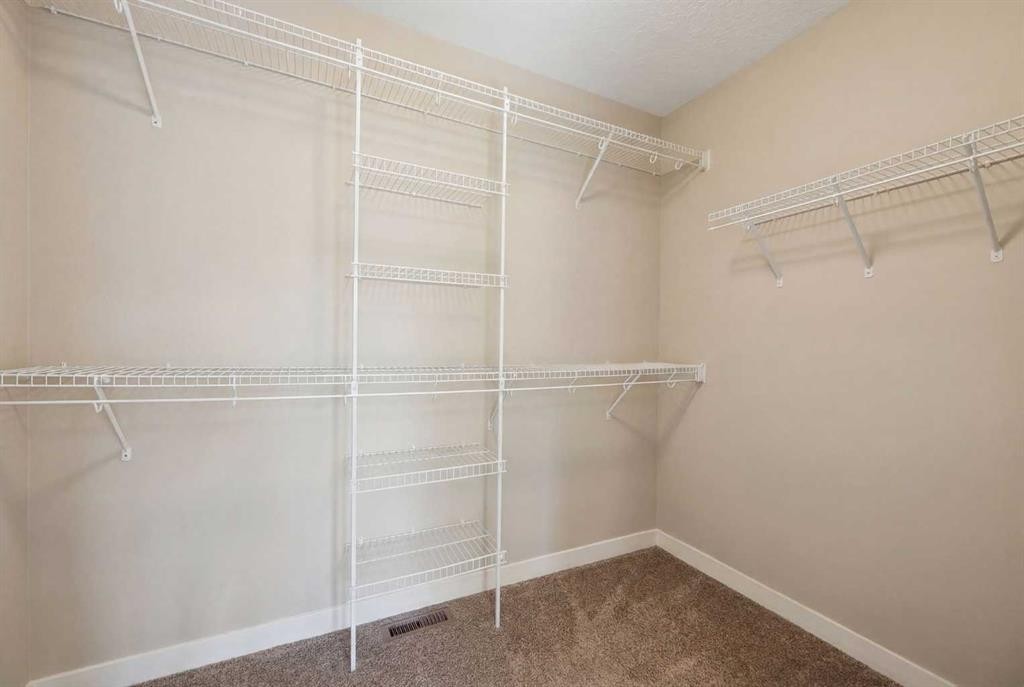 344 Sunset View, Cochrane, AB - Indoor With Storage