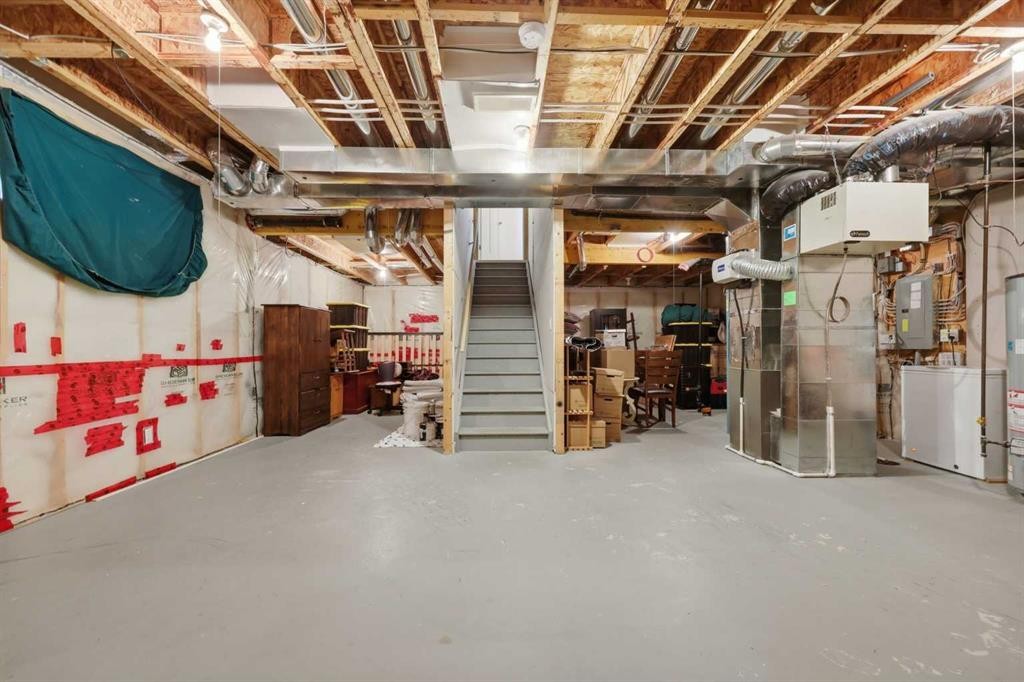 344 Sunset View, Cochrane, AB - Indoor Photo Showing Basement