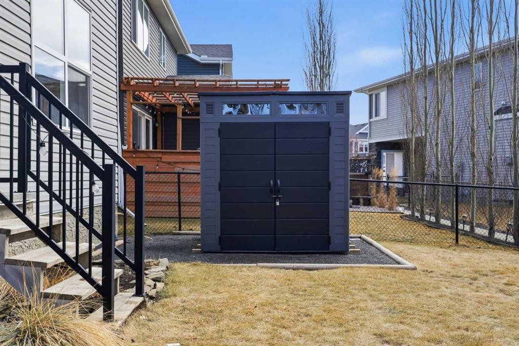 344 Sunset View, Cochrane, AB - Outdoor With Exterior