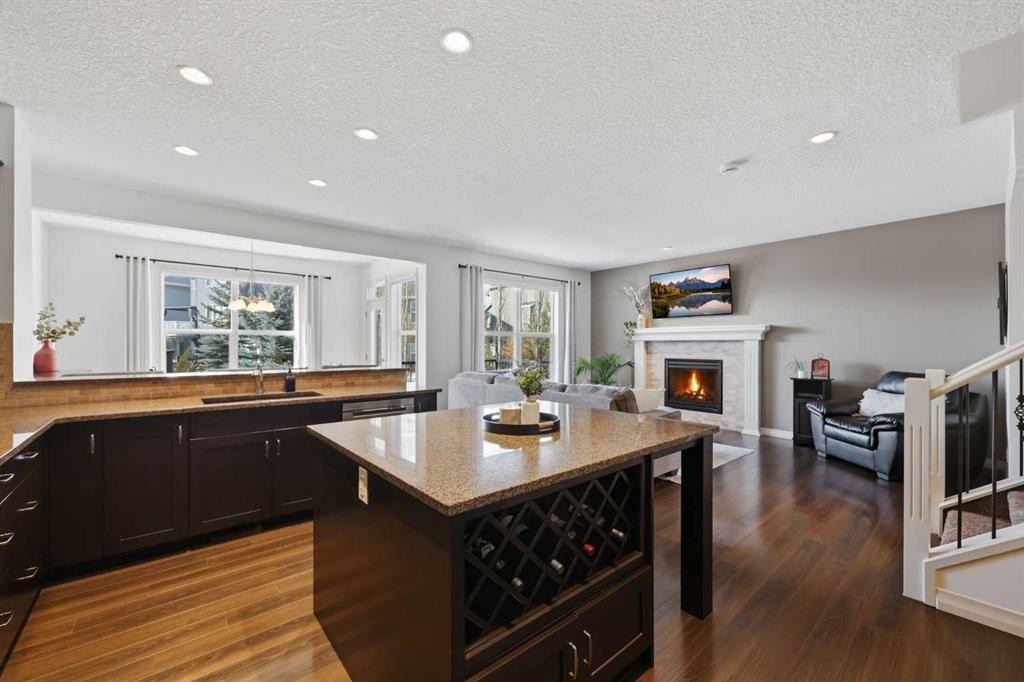 344 Sunset View, Cochrane, AB - Indoor With Fireplace