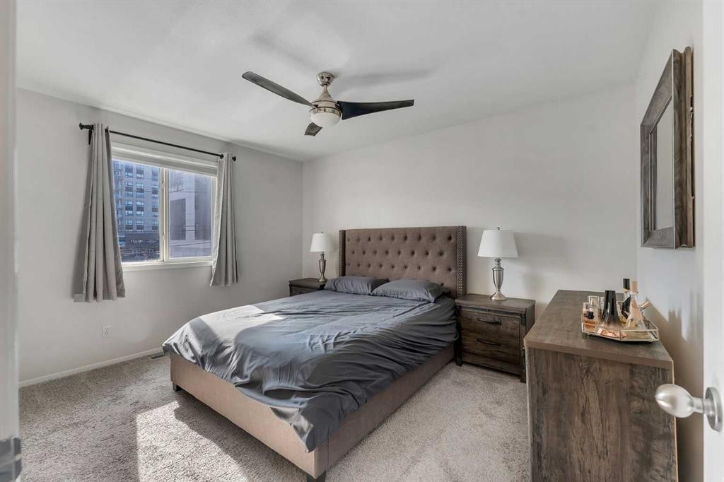 201-215 17 Avenue Ne, Calgary, AB - Indoor Photo Showing Bedroom