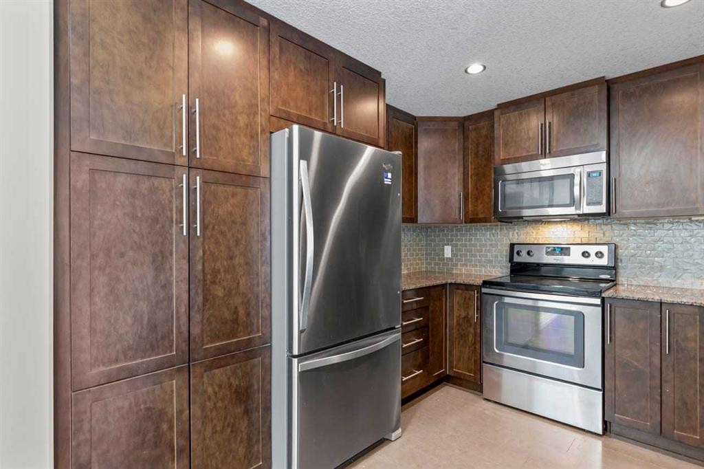 310-16 Varsity Estates Circle Nw, Calgary, AB - Indoor Photo Showing Kitchen With Stainless Steel Kitchen
