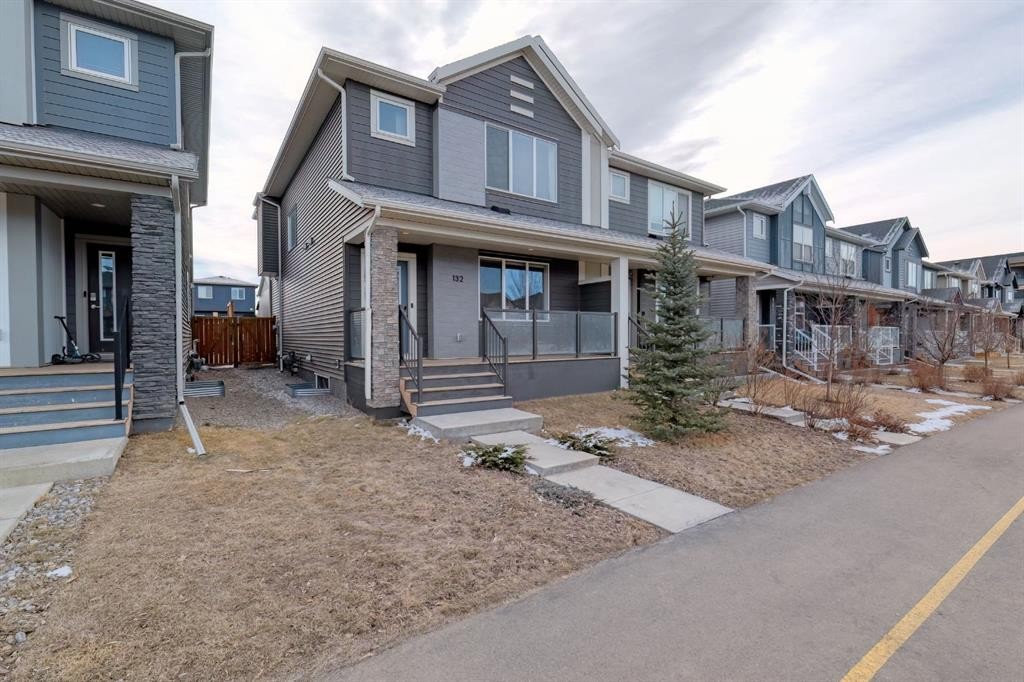 132 Wolf Willow Boulevard Se, Calgary, AB - Outdoor With Deck Patio Veranda With Facade