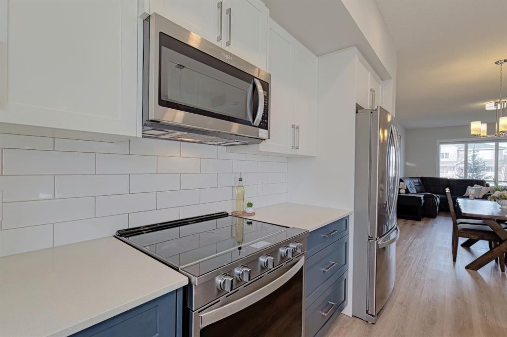132 Wolf Willow Boulevard Se, Calgary, AB - Indoor Photo Showing Kitchen With Stainless Steel Kitchen With Upgraded Kitchen