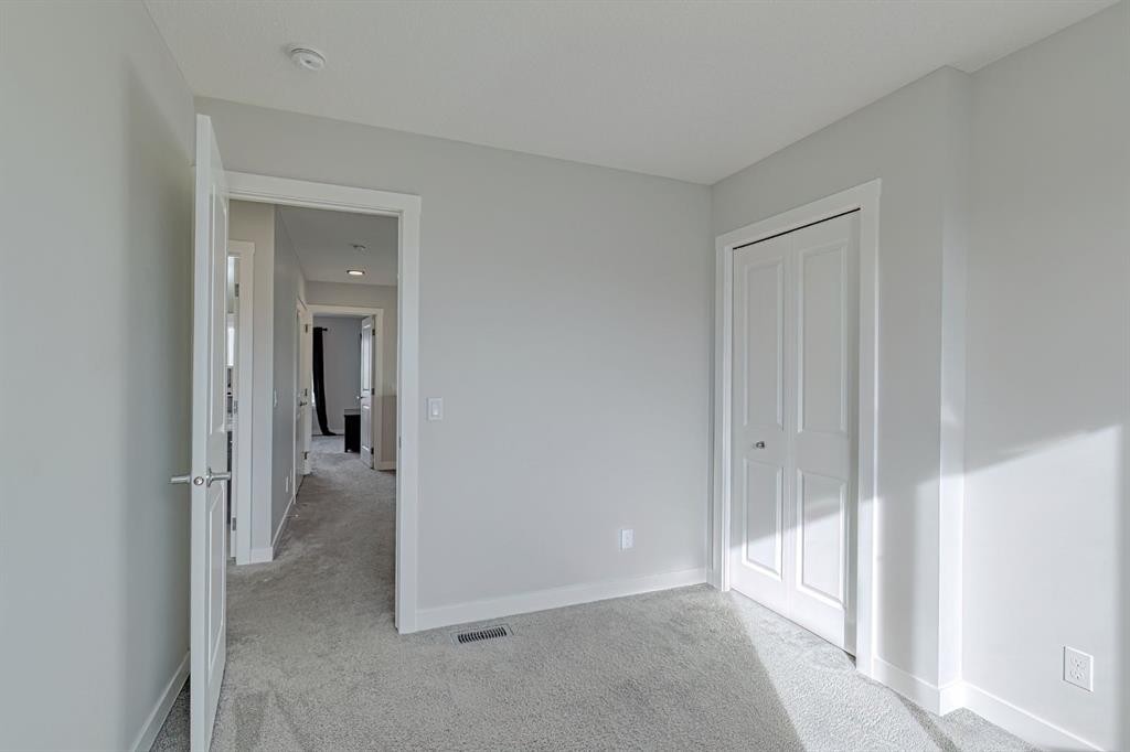 132 Wolf Willow Boulevard Se, Calgary, AB - Indoor Photo Showing Other Room