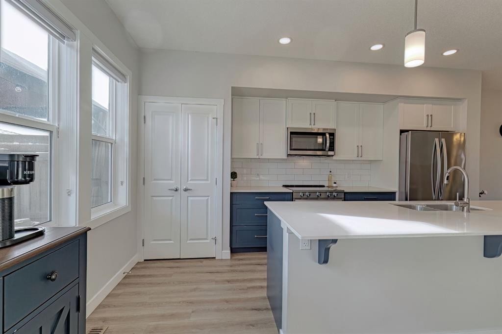 132 Wolf Willow Boulevard Se, Calgary, AB - Indoor Photo Showing Kitchen With Stainless Steel Kitchen With Double Sink With Upgraded Kitchen