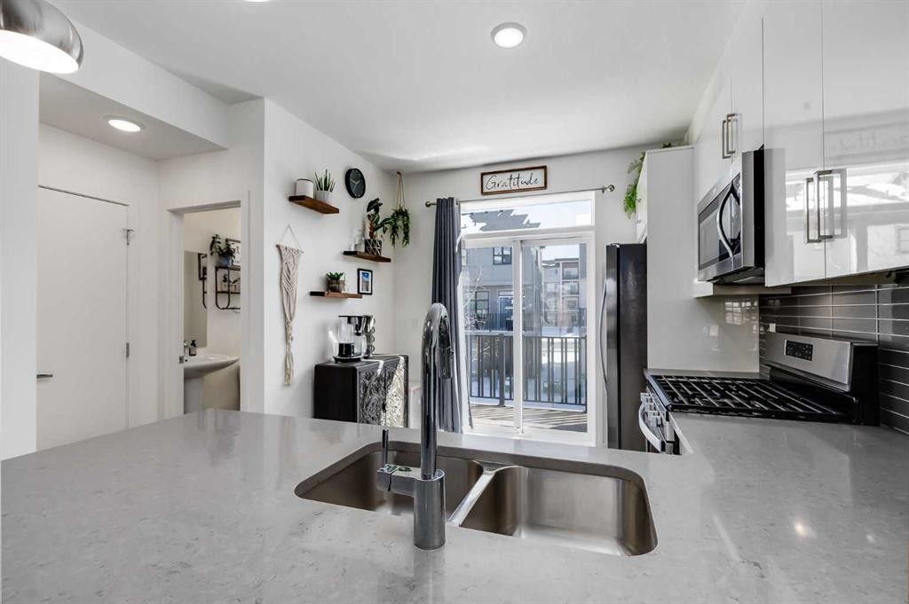 160 Walden Path Se, Calgary, AB - Indoor Photo Showing Kitchen With Double Sink