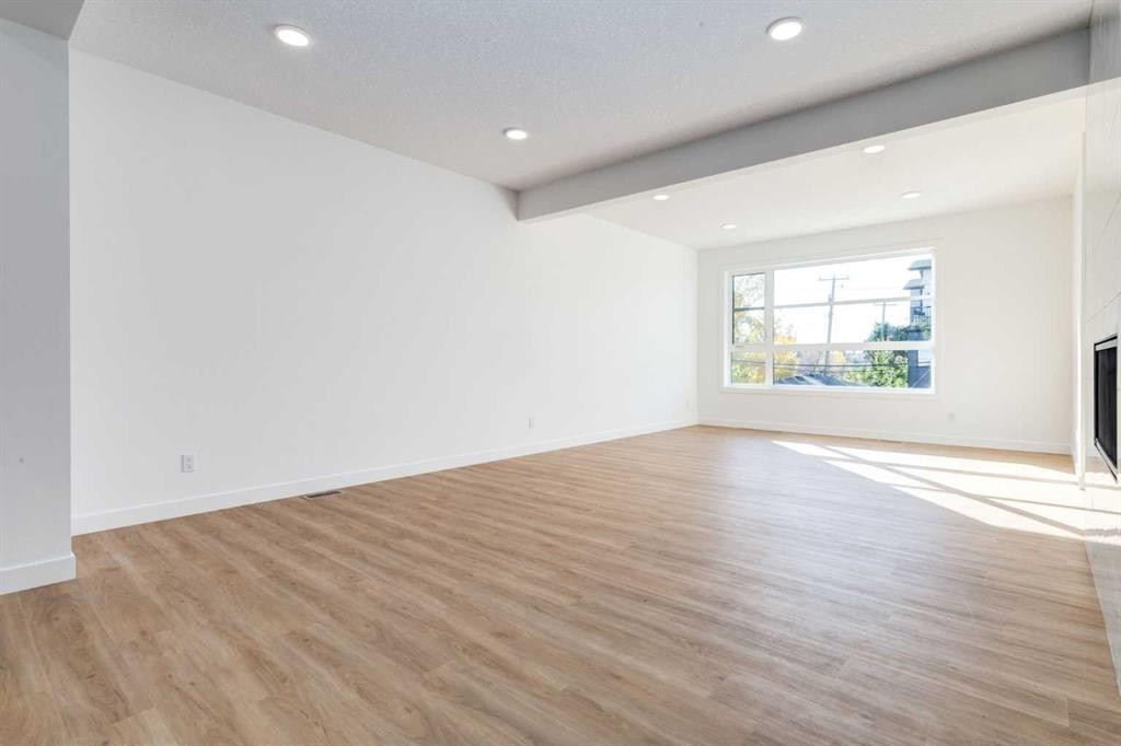 2520 21 Avenue Sw, Calgary, AB - Indoor Photo Showing Other Room With Fireplace