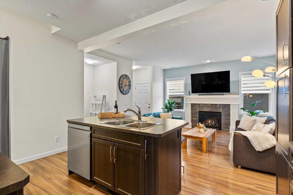 1303 New Brighton Park Se, Calgary, AB - Indoor With Fireplace
