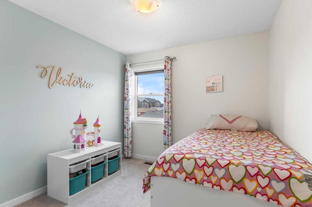 1303 New Brighton Park Se, Calgary, AB - Indoor Photo Showing Bedroom