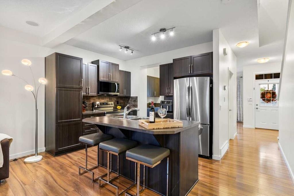 1303 New Brighton Park Se, Calgary, AB - Indoor Photo Showing Kitchen With Upgraded Kitchen