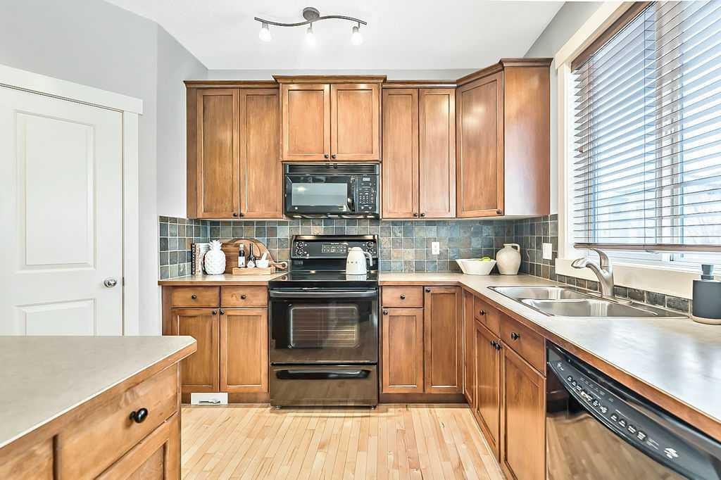87 Chaparral Grove Se, Calgary, AB - Indoor Photo Showing Kitchen With Double Sink