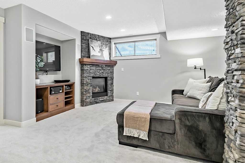 87 Chaparral Grove Se, Calgary, AB - Indoor Photo Showing Living Room With Fireplace