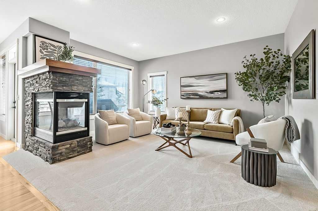 87 Chaparral Grove Se, Calgary, AB - Indoor Photo Showing Living Room With Fireplace