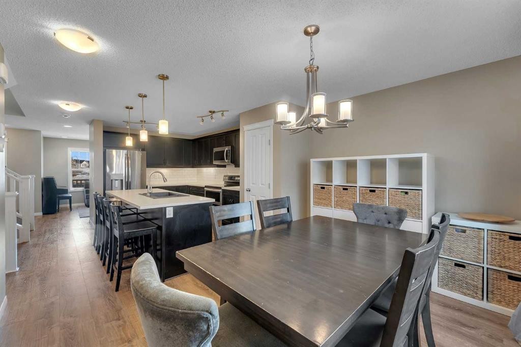 23 Copperpond Square Se, Calgary, AB - Indoor Photo Showing Dining Room