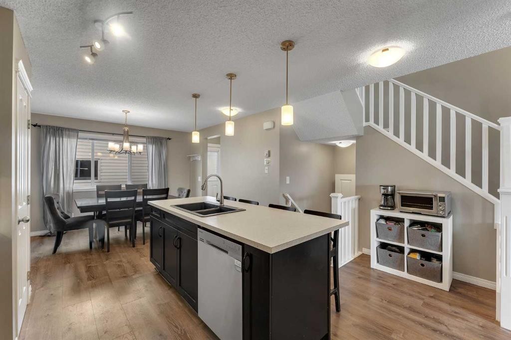 23 Copperpond Square Se, Calgary, AB - Indoor Photo Showing Kitchen With Double Sink With Upgraded Kitchen