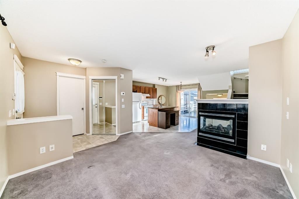 240 Prestwick Way Se, Calgary, AB - Indoor With Fireplace