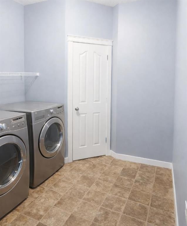 1580 New Brighton Drive Se, Calgary, AB - Indoor Photo Showing Laundry Room