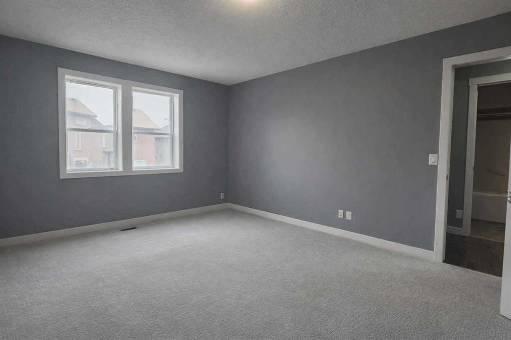 1580 New Brighton Drive Se, Calgary, AB - Indoor Photo Showing Other Room
