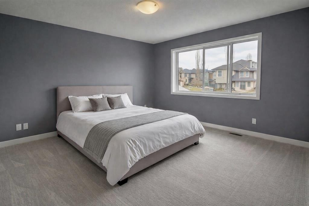 1580 New Brighton Drive Se, Calgary, AB - Indoor Photo Showing Bedroom