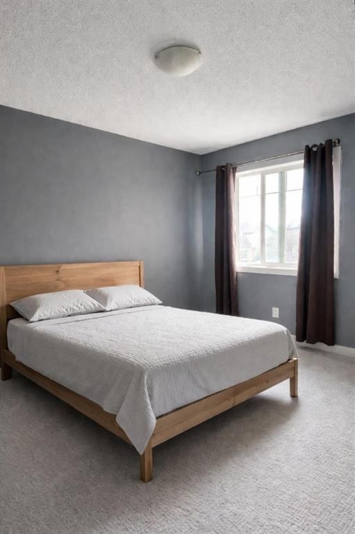 1580 New Brighton Drive Se, Calgary, AB - Indoor Photo Showing Bedroom