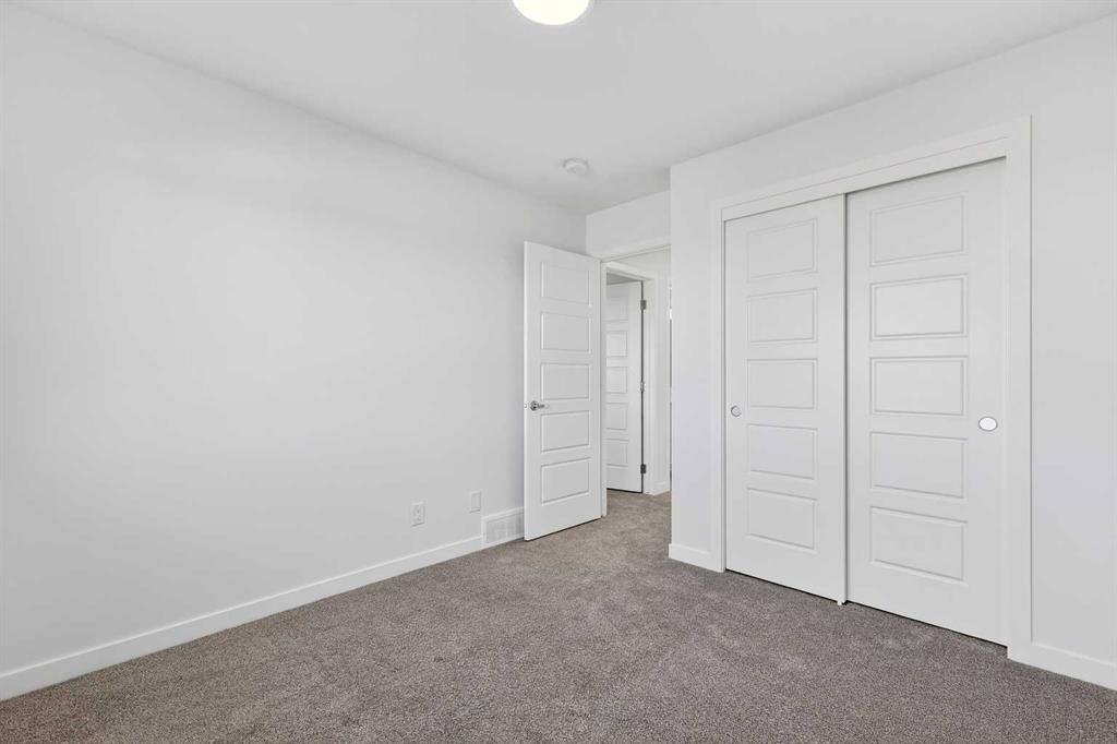1007-132 Red Embers Link Ne, Calgary, AB - Indoor Photo Showing Other Room