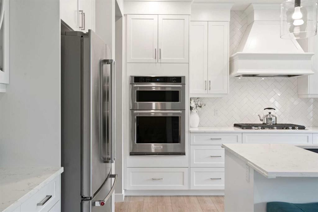 36 Cranbrook Cape Se, Calgary, AB - Indoor Photo Showing Kitchen With Stainless Steel Kitchen With Upgraded Kitchen