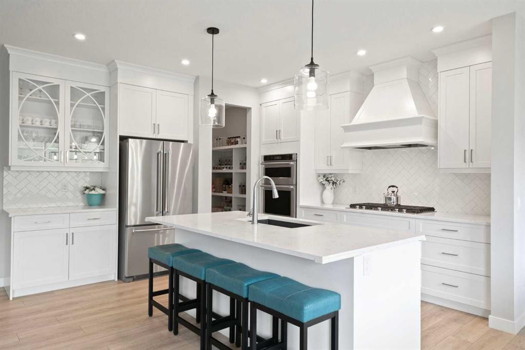 36 Cranbrook Cape Se, Calgary, AB - Indoor Photo Showing Kitchen With Stainless Steel Kitchen With Upgraded Kitchen