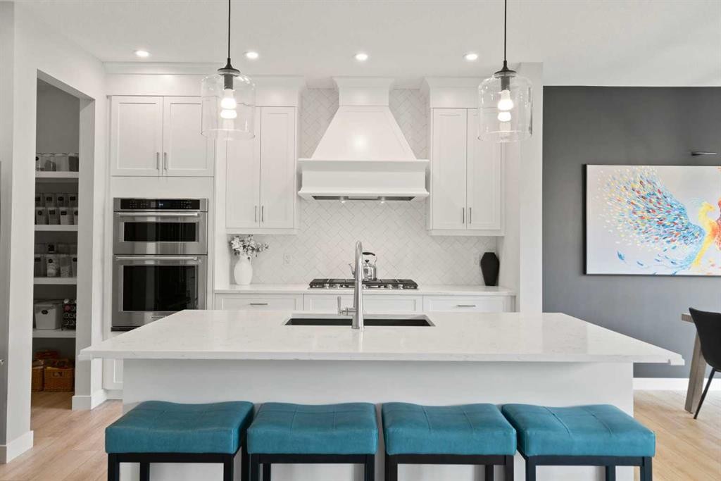 36 Cranbrook Cape Se, Calgary, AB - Indoor Photo Showing Kitchen With Upgraded Kitchen