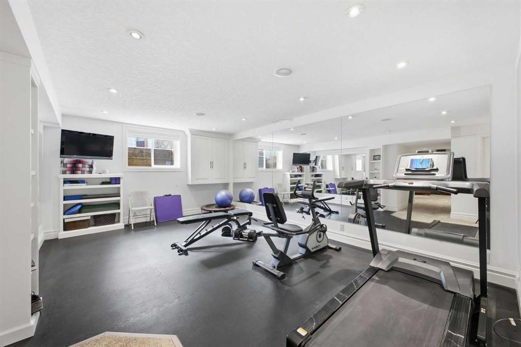 23 Deermoss Place Se, Calgary, AB - Indoor Photo Showing Gym Room