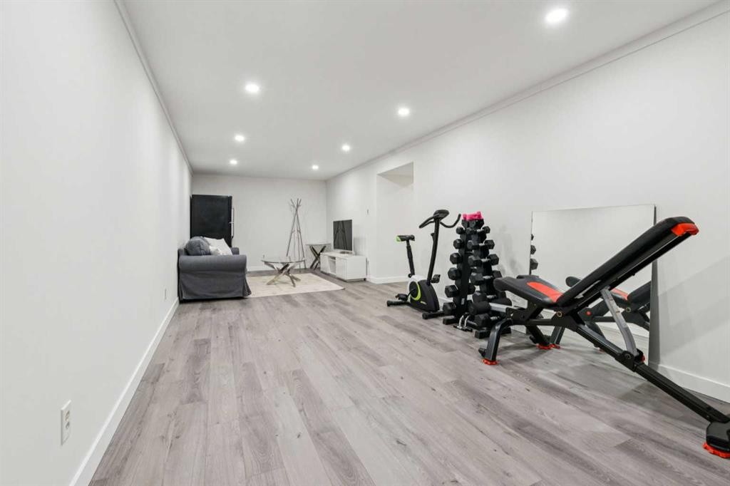 7207 Farrell Road Se, Calgary, AB - Indoor Photo Showing Gym Room