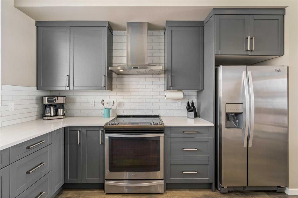 15 Masters Square Se, Calgary, AB - Indoor Photo Showing Kitchen With Stainless Steel Kitchen With Upgraded Kitchen
