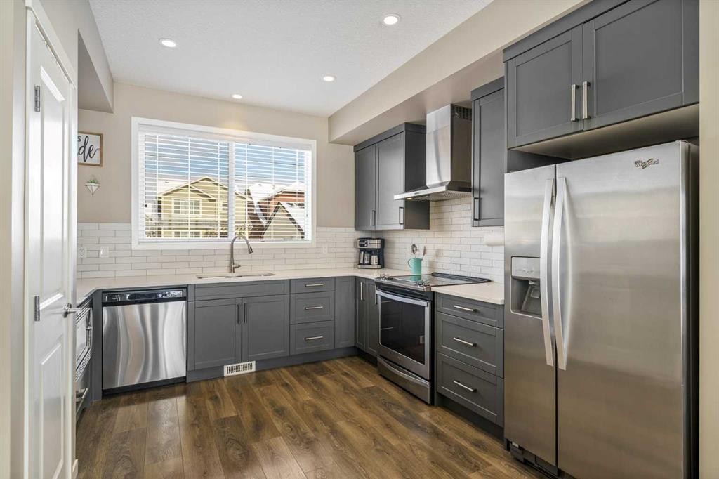15 Masters Square Se, Calgary, AB - Indoor Photo Showing Kitchen With Stainless Steel Kitchen With Upgraded Kitchen