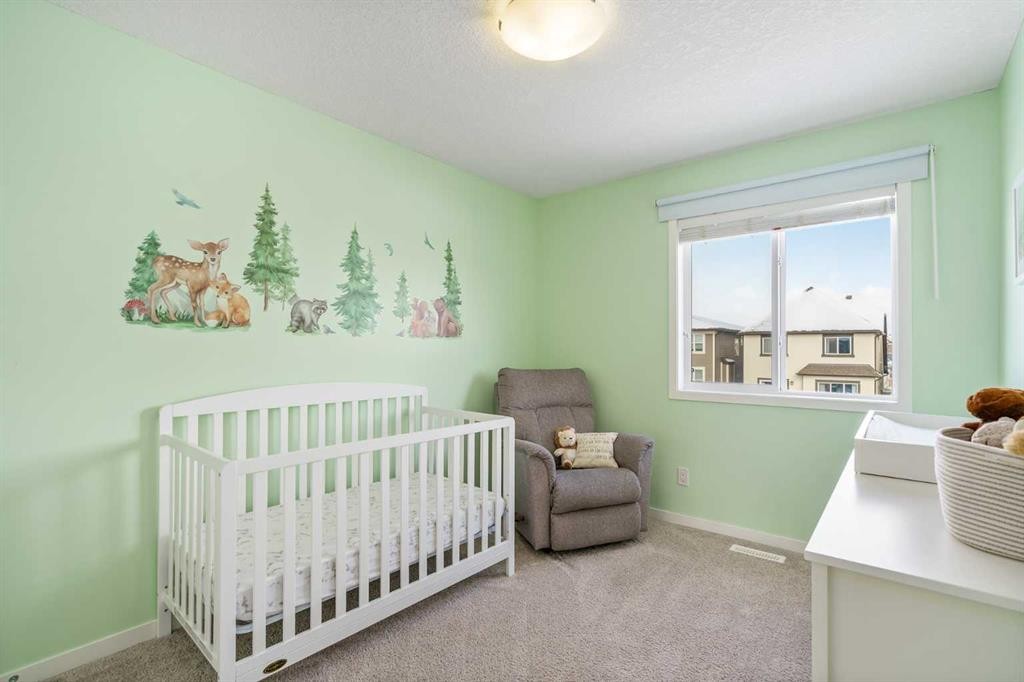 15 Masters Square Se, Calgary, AB - Indoor Photo Showing Bedroom