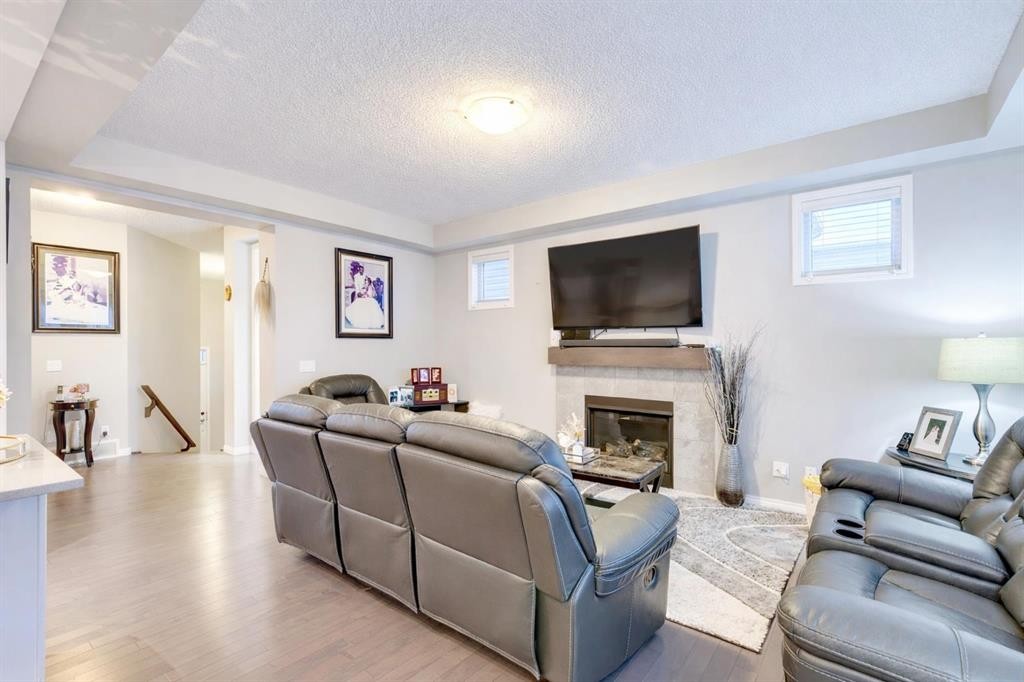 61 Cityscape View Ne, Calgary, AB - Indoor Photo Showing Living Room With Fireplace