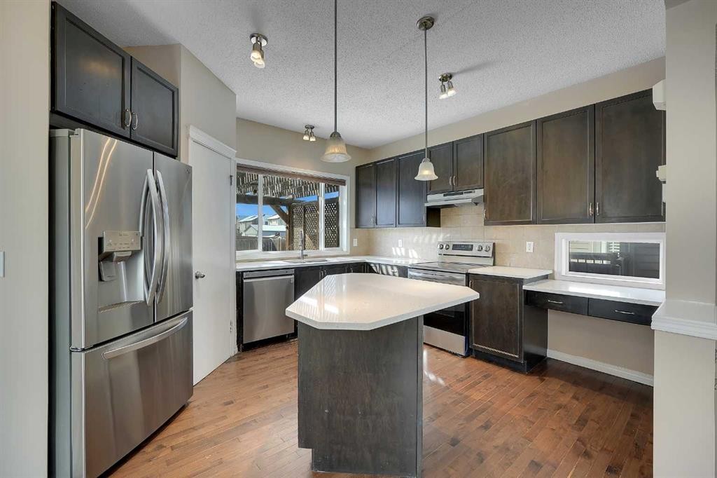 1833 New Brighton Drive Se, Calgary, AB - Indoor Photo Showing Kitchen With Stainless Steel Kitchen With Upgraded Kitchen