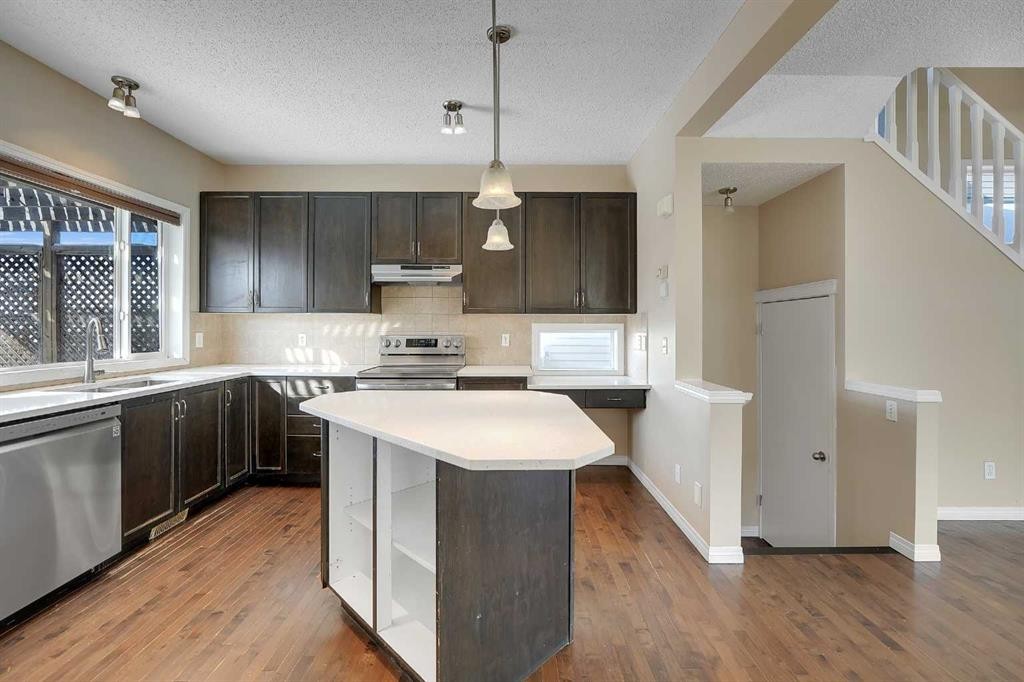 1833 New Brighton Drive Se, Calgary, AB - Indoor Photo Showing Kitchen With Stainless Steel Kitchen With Double Sink