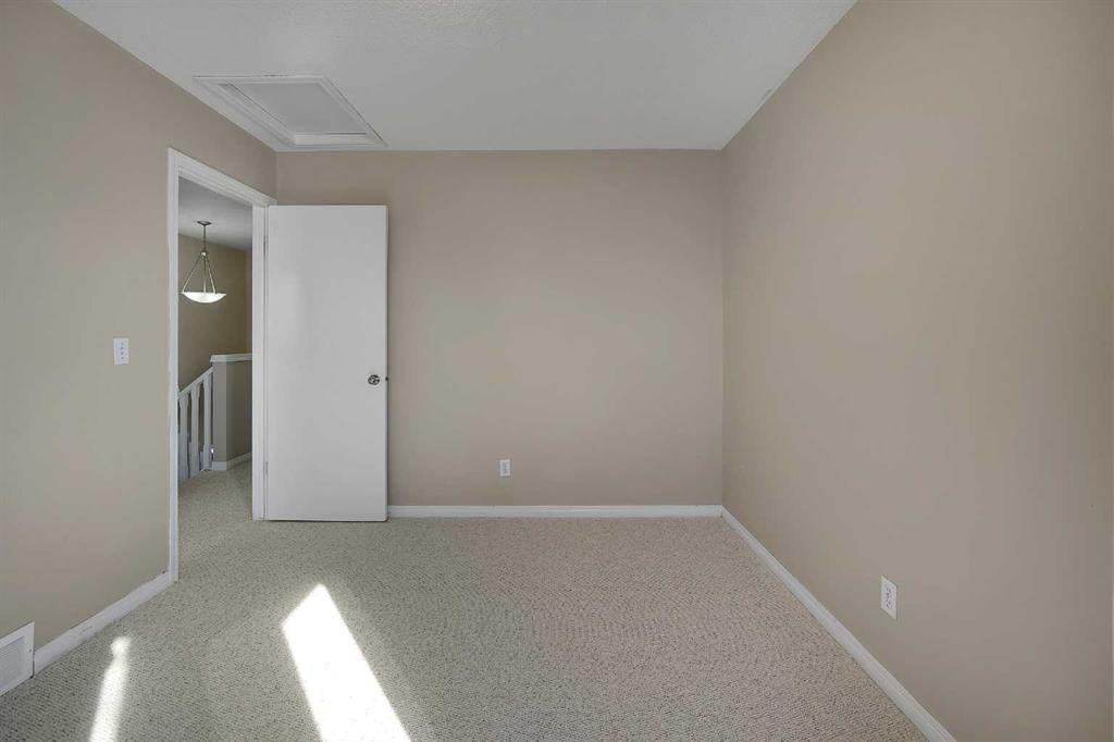 1833 New Brighton Drive Se, Calgary, AB - Indoor Photo Showing Other Room