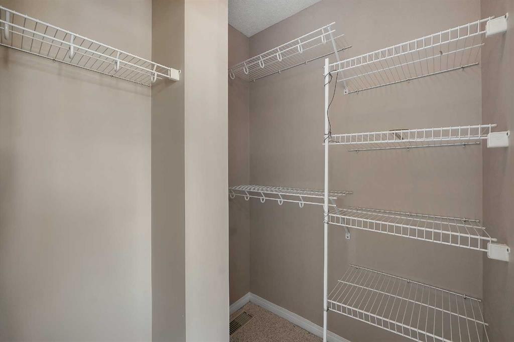 1833 New Brighton Drive Se, Calgary, AB - Indoor With Storage