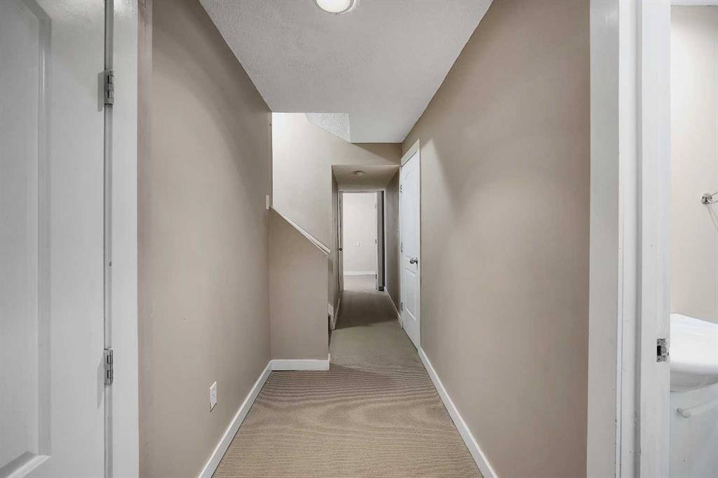 1833 New Brighton Drive Se, Calgary, AB - Indoor Photo Showing Other Room