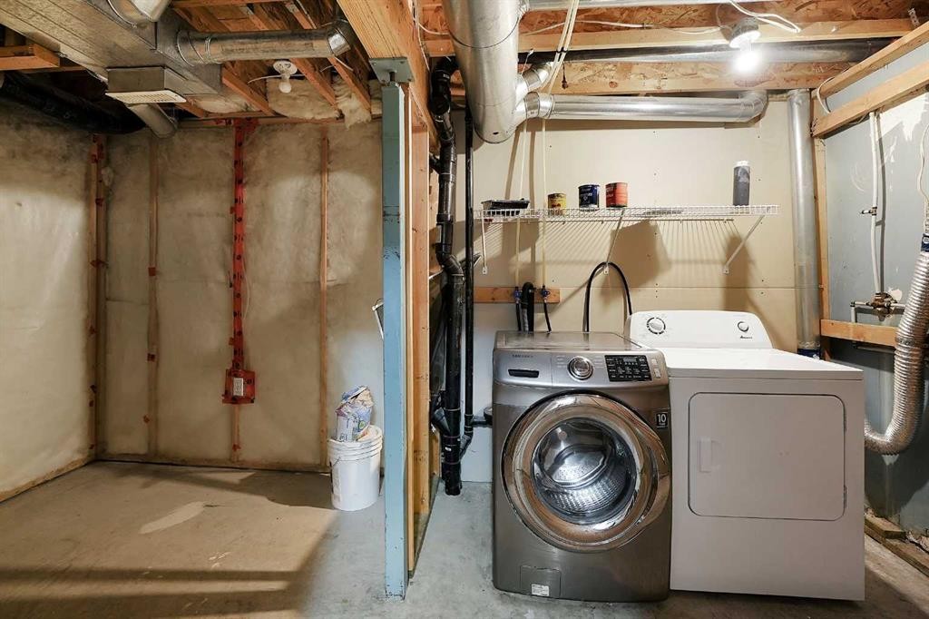 1833 New Brighton Drive Se, Calgary, AB - Indoor Photo Showing Laundry Room