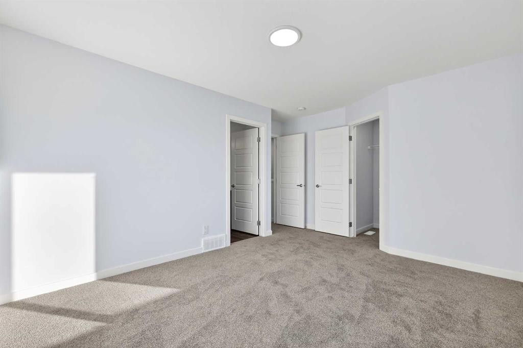 1023-132 Red Embers Link Ne, Calgary, AB - Indoor Photo Showing Other Room