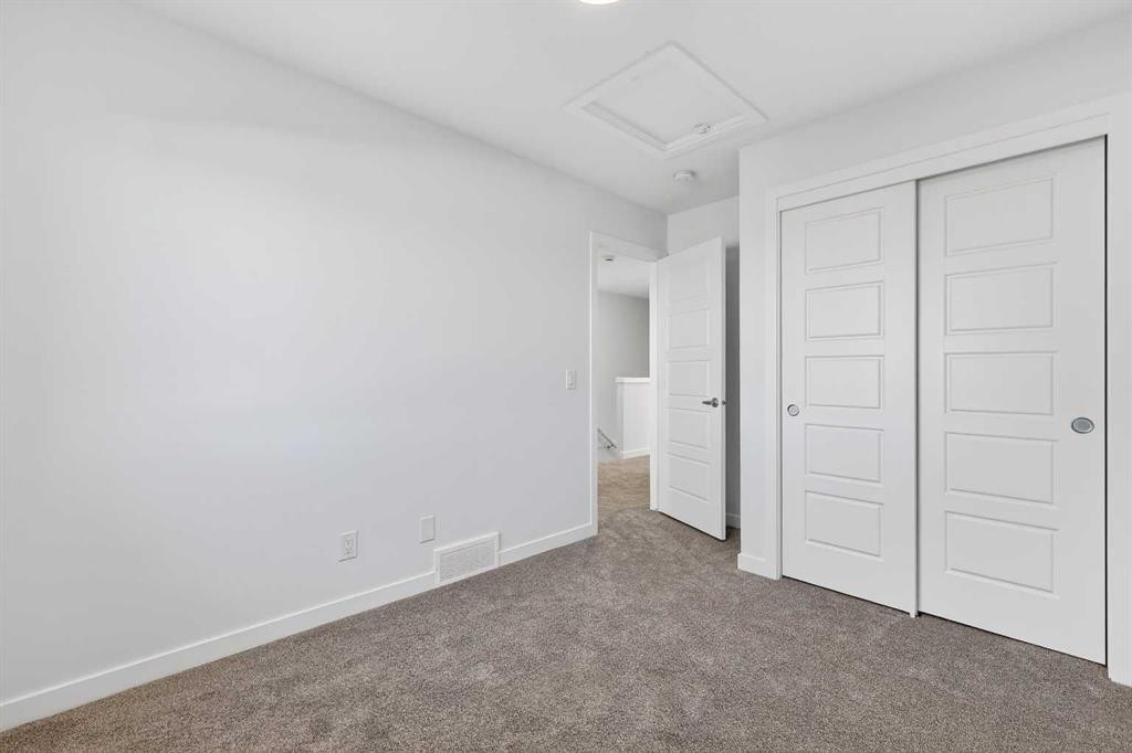 1023-132 Red Embers Link Ne, Calgary, AB - Indoor Photo Showing Other Room