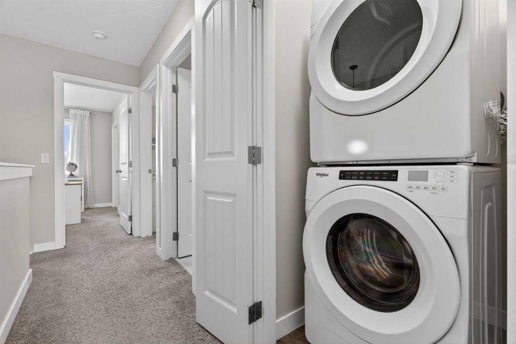 67 Wolf Willow Boulevard Se, Calgary, AB - Indoor Photo Showing Laundry Room