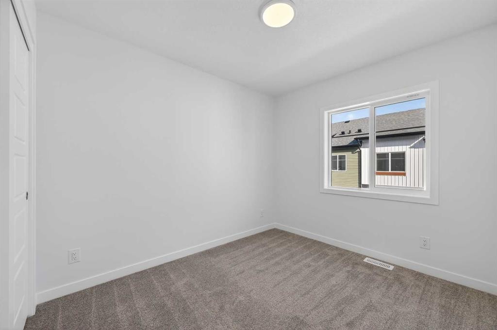 906-132 Red Embers Link Ne, Calgary, AB - Indoor Photo Showing Other Room